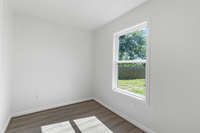3501 Alta Vista Dr, Waco, TX 76706 - spare room featuring wood finished floors and baseboards