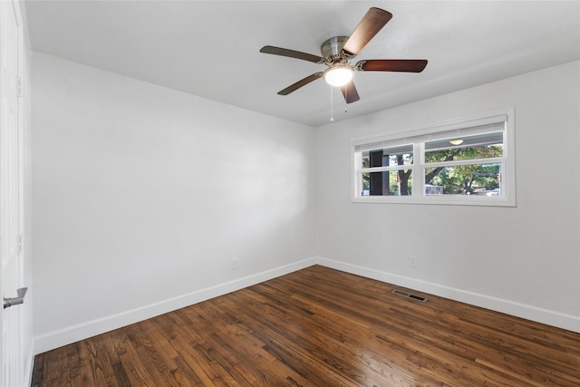 3501 Alta Vista Dr, Waco, TX 76706 - unfurnished room featuring dark wood-style flooring and a ceiling fan