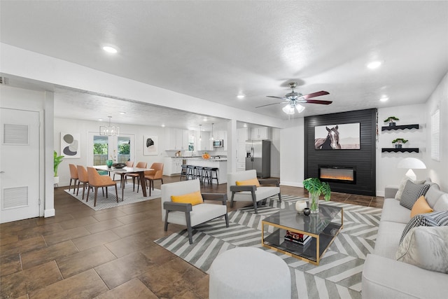 3501 Alta Vista Dr, Waco, TX 76706 - living room featuring a fireplace, ceiling fan, and recessed lighting