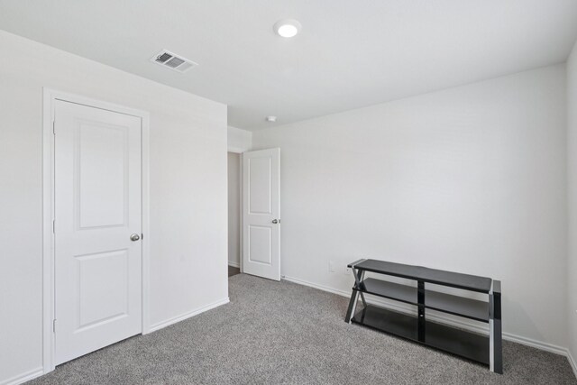 288 Thoroughbred St, Waxahachie, TX 75165 - unfurnished bedroom with carpet flooring and baseboards