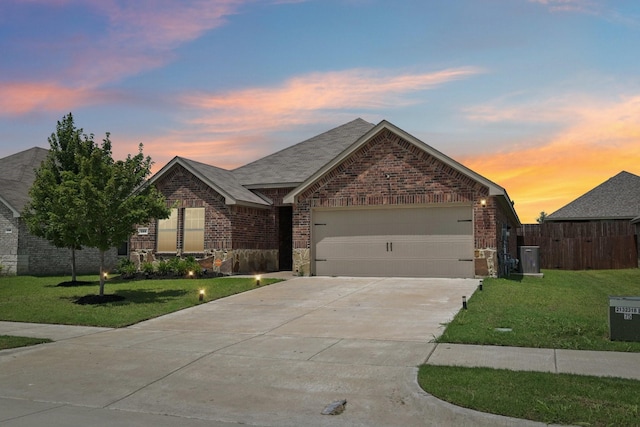 288 Thoroughbred St, Waxahachie, TX 75165 - single story home featuring an attached garage, concrete driveway, brick siding, a shingled roof, and stone siding