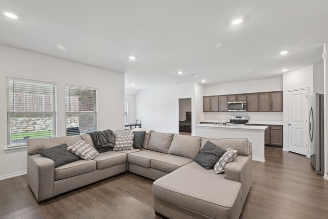288 Thoroughbred St, Waxahachie, TX 75165 - living room with dark wood-style floors and recessed lighting