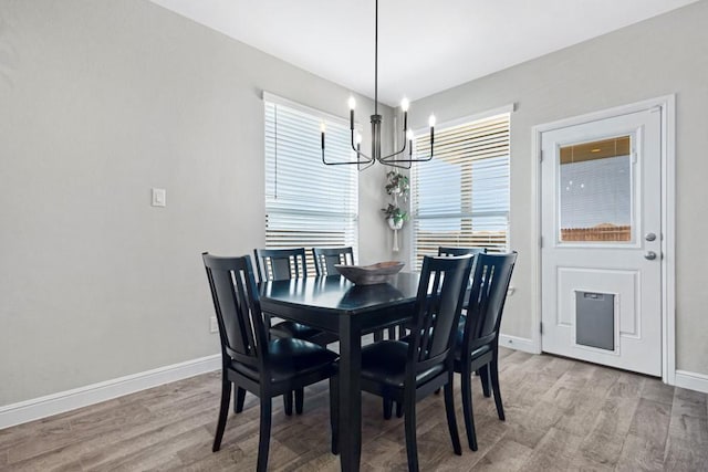 1160 Kirkham Way, Fort Worth, TX 76247 - dining area featuring a chandelier and light wood finished floors