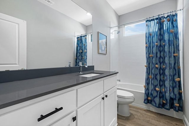 1160 Kirkham Way, Fort Worth, TX 76247 - bathroom with wood finished floors, vanity, and shower / tub combo