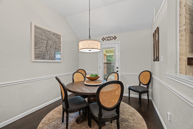416 Springhill Dr, Hurst, TX 76054 - dining room featuring lofted ceiling and dark wood-type flooring