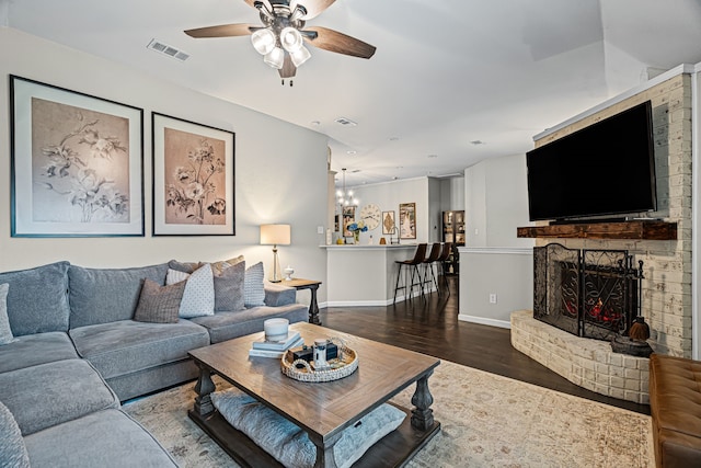 416 Springhill Dr, Hurst, TX 76054 - living room with a ceiling fan, wood finished floors, and a fireplace