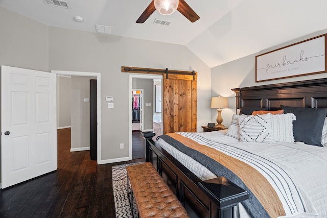 416 Springhill Dr, Hurst, TX 76054 - bedroom with a barn door, vaulted ceiling, wood finished floors, and ceiling fan