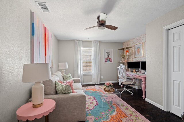 416 Springhill Dr, Hurst, TX 76054 - home office featuring a ceiling fan, dark wood finished floors, and a textured wall