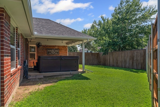 416 Springhill Dr, Hurst, TX 76054 - fenced backyard with a hot tub and a patio