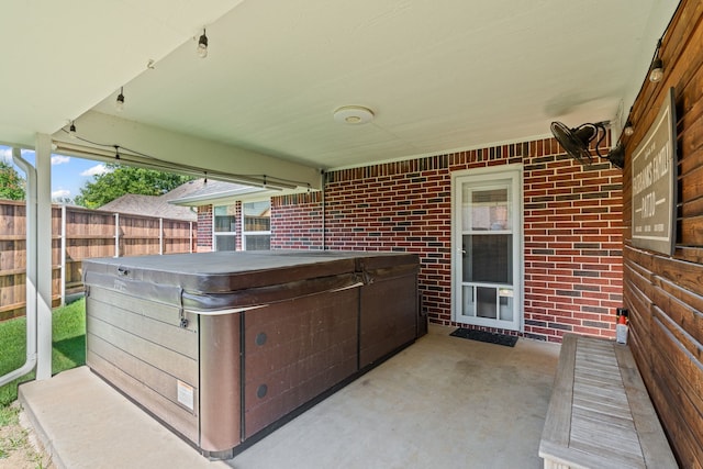 416 Springhill Dr, Hurst, TX 76054 - view of patio / terrace featuring a hot tub