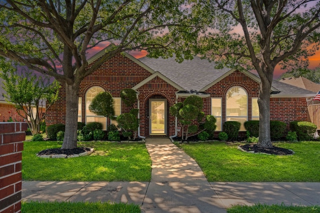 416 Springhill Dr, Hurst, TX 76054 - view of front of home with brick siding and roof with shingles