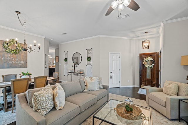 416 Springhill Dr, Hurst, TX 76054 - living area featuring ornamental molding, a chandelier, wood finished floors, and ceiling fan