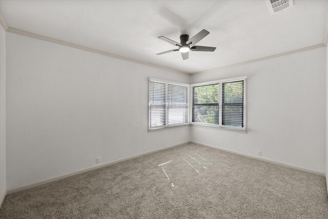1205 Columbia Cir, Corsicana, TX 75110 - empty room with carpet, ceiling fan, and crown molding