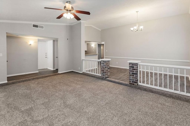 4229 Shagbark St, Fort Worth, TX 76137 - unfurnished living room with vaulted ceiling, ceiling fan, carpet, a chandelier, and crown molding