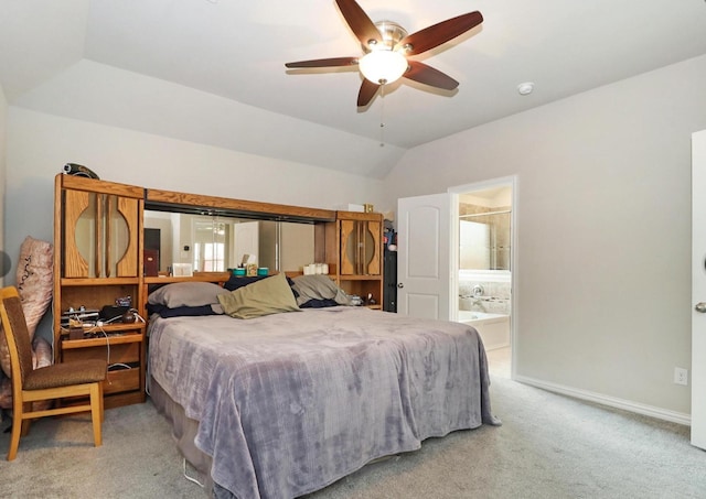 505 Reatta Dr, Justin, TX 76247 - bedroom with light carpet, vaulted ceiling, and connected bathroom