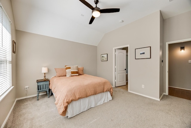 2823 Coteau Way, Dallas, TX 75227 - bedroom with light carpet, multiple windows, lofted ceiling, and a ceiling fan