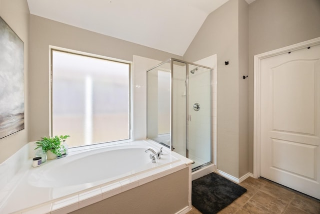 2823 Coteau Way, Dallas, TX 75227 - full bathroom with a shower stall, a garden tub, and lofted ceiling