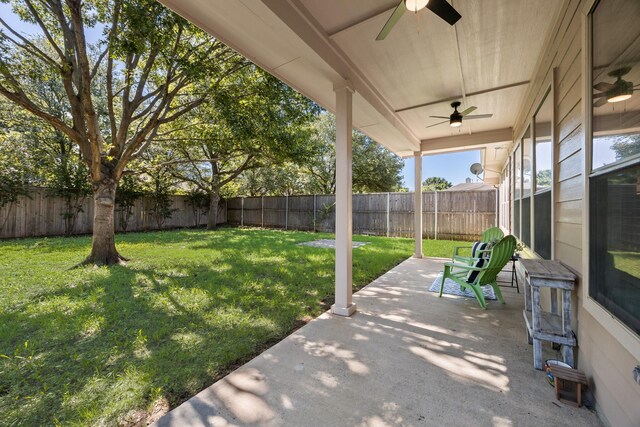 2823 Coteau Way, Dallas, TX 75227 - fenced backyard featuring a ceiling fan and a patio