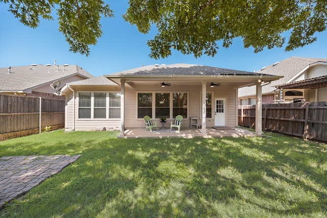 2823 Coteau Way, Dallas, TX 75227 - back of house featuring ceiling fan, a fenced backyard, a patio, and a shingled roof