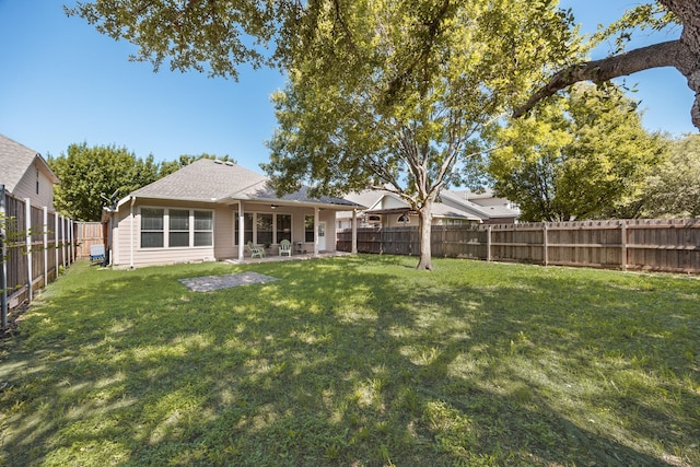 2823 Coteau Way, Dallas, TX 75227 - rear view of property featuring a fenced backyard and a patio area