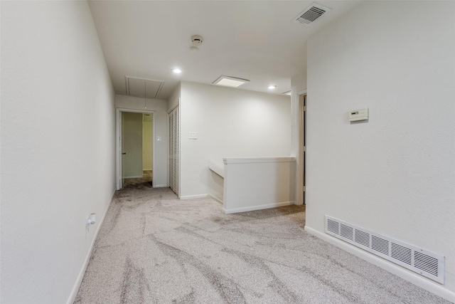 7450 Holly Hill Dr Unit 115, Dallas, TX 75231 - empty room with attic access, carpet flooring, and recessed lighting