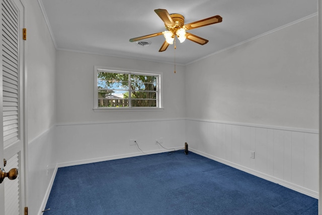 824 Captain Shreve Dr, Shreveport, LA 71105 - unfurnished room with dark colored carpet, a ceiling fan, and ornamental molding
