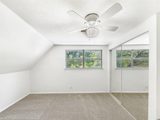 5941 Ten Mile Bridge Rd, Fort Worth, TX 76135 - bonus room featuring carpet, ceiling fan, a textured ceiling, and lofted ceiling