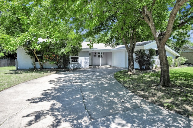 5125 Susan Lee Ln, North Richland Hills, TX 76180 - view of front of house featuring an attached garage and concrete driveway