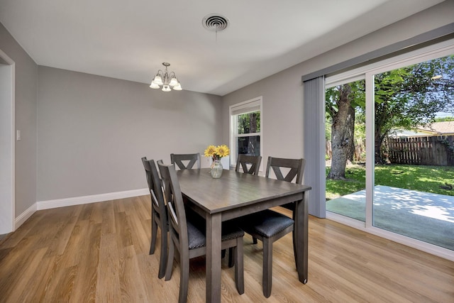 5125 Susan Lee Ln, North Richland Hills, TX 76180 - dining room with a chandelier and light wood finished floors