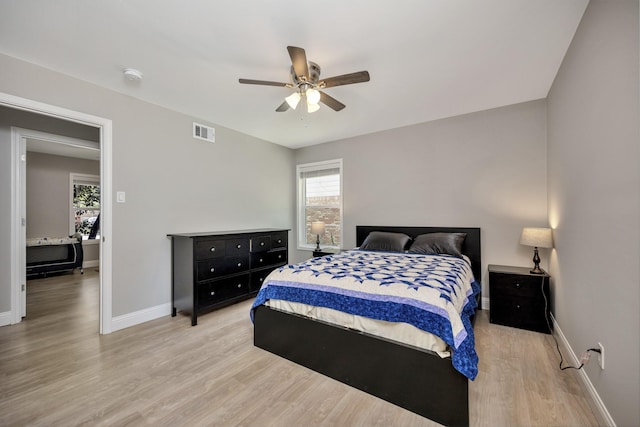 5125 Susan Lee Ln, North Richland Hills, TX 76180 - bedroom featuring light wood-style flooring and a ceiling fan