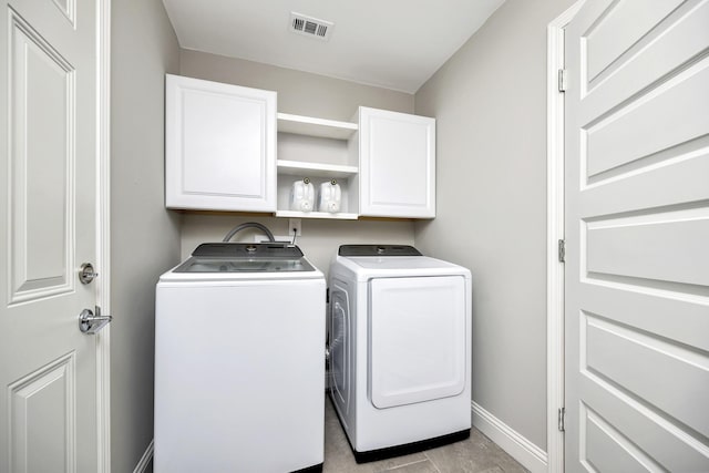 5125 Susan Lee Ln, North Richland Hills, TX 76180 - laundry room with cabinet space and independent washer and dryer