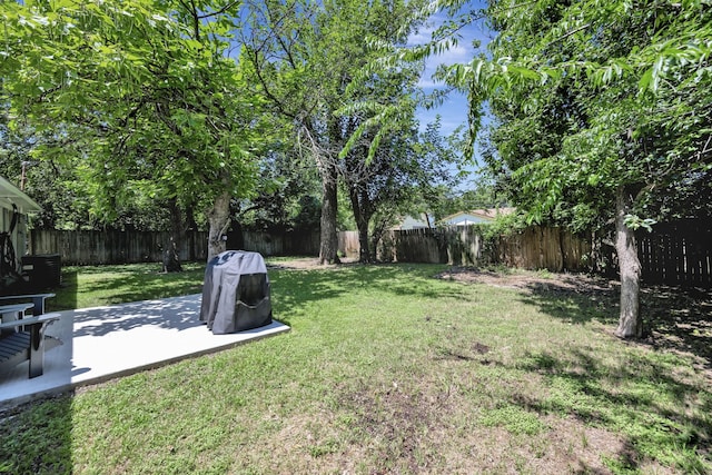 5125 Susan Lee Ln, North Richland Hills, TX 76180 - fenced backyard with a patio area