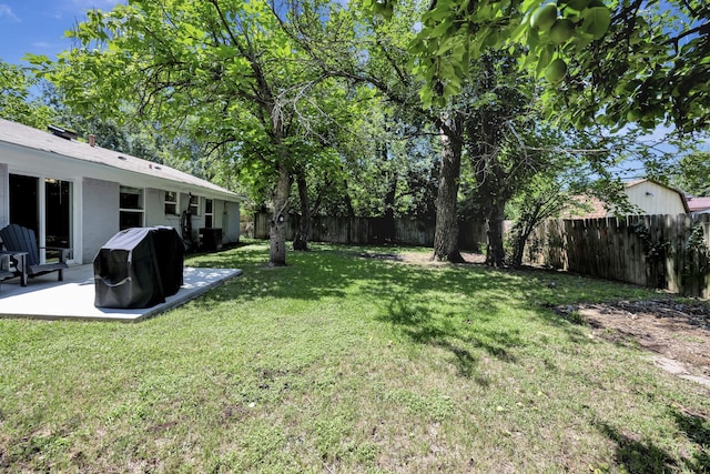 5125 Susan Lee Ln, North Richland Hills, TX 76180 - fenced backyard with a patio area