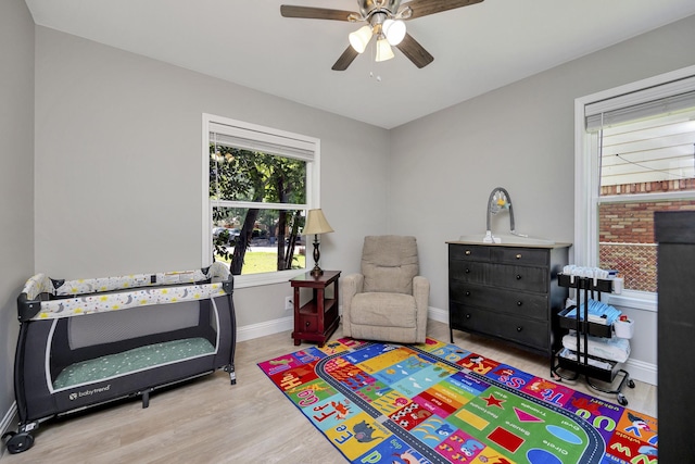 5125 Susan Lee Ln, North Richland Hills, TX 76180 - recreation room with ceiling fan and wood finished floors