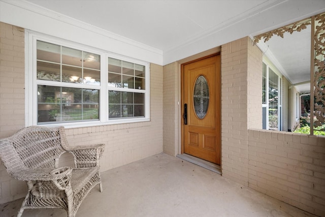 1215 Columbia Cir, Corsicana, TX 75110 - property entrance featuring brick siding and a porch