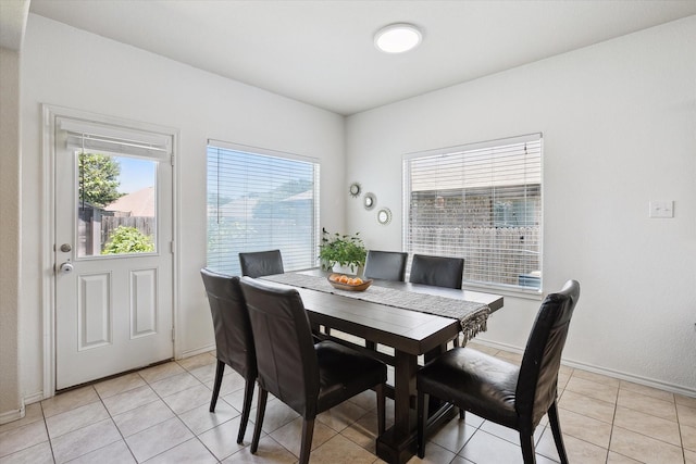 616 Cameron Way, Azle, TX 76020 - dining area featuring healthy amount of natural light and light tile patterned floors