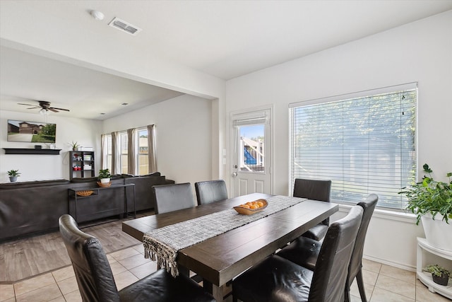 616 Cameron Way, Azle, TX 76020 - dining space featuring light tile patterned floors and ceiling fan