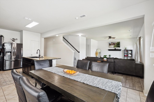616 Cameron Way, Azle, TX 76020 - dining space featuring stairs, light tile patterned floors, and a ceiling fan