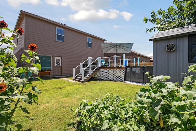 616 Cameron Way, Azle, TX 76020 - back of property with a wooden deck, a lawn, and stairway