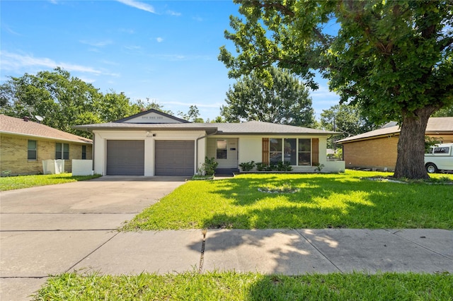 3122 Old Orchard Rd, Garland, TX 75041 - ranch-style home featuring a garage, concrete driveway, and a front lawn