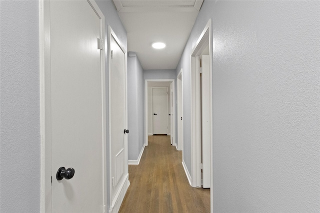 3122 Old Orchard Rd, Garland, TX 75041 - hallway featuring wood finished floors and attic access