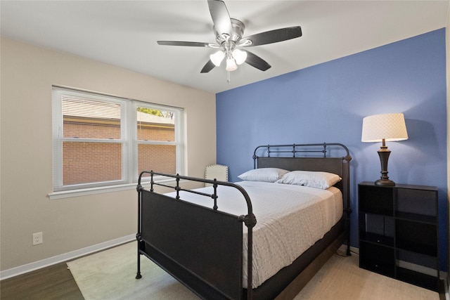 3122 Old Orchard Rd, Garland, TX 75041 - bedroom featuring wood finished floors and ceiling fan