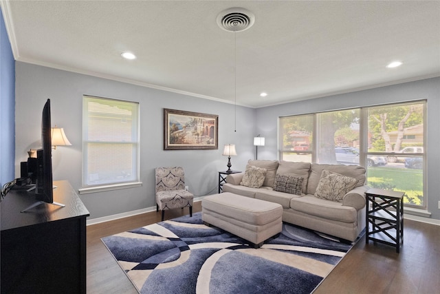 3122 Old Orchard Rd, Garland, TX 75041 - living area featuring dark wood-type flooring, plenty of natural light, crown molding, and recessed lighting