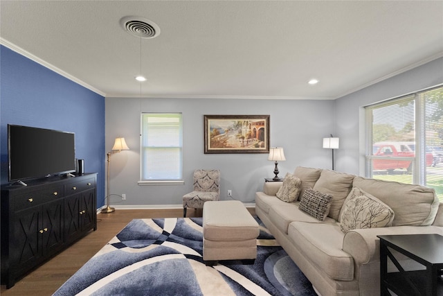 3122 Old Orchard Rd, Garland, TX 75041 - living room with crown molding, wood finished floors, and recessed lighting