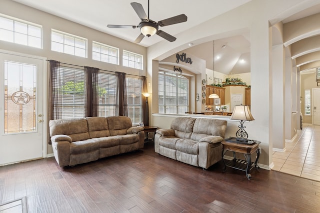 5606 Bay Meadows Dr, Frisco, TX 75034 - living room with a ceiling fan, hardwood / wood-style floors, arched walkways, and high vaulted ceiling