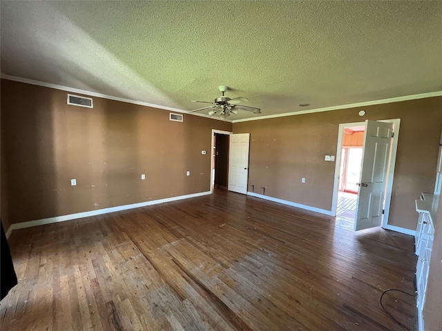 2928 Pine Ave, Waco, TX 76708 - spare room with a textured ceiling, hardwood / wood-style flooring, a ceiling fan, and crown molding