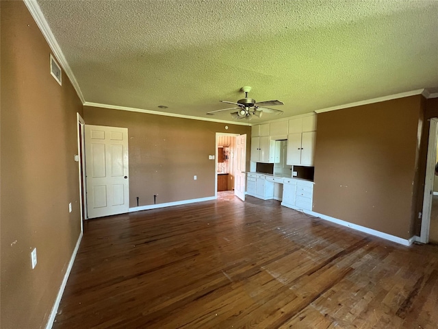 2928 Pine Ave, Waco, TX 76708 - unfurnished living room featuring dark wood-type flooring, a textured ceiling, ornamental molding, and ceiling fan