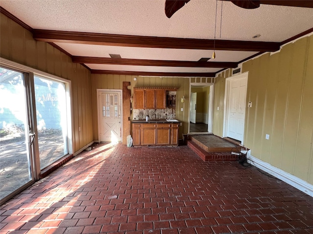 2928 Pine Ave, Waco, TX 76708 - unfurnished sunroom featuring beamed ceiling