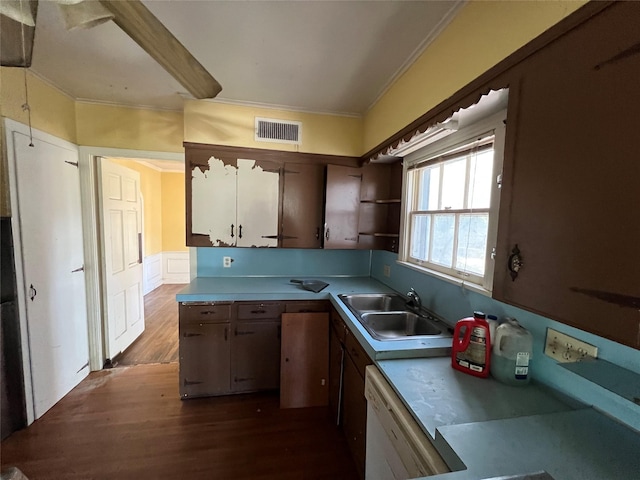 2928 Pine Ave, Waco, TX 76708 - kitchen with ornamental molding, dark wood-style flooring, white dishwasher, open shelves, and wainscoting