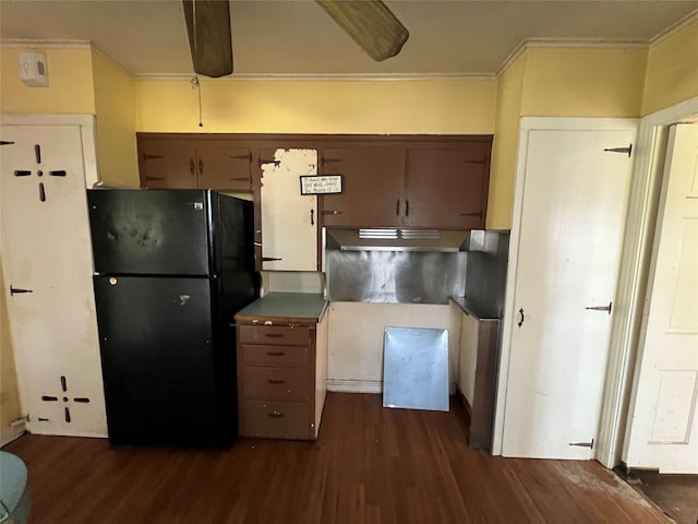 2928 Pine Ave, Waco, TX 76708 - kitchen with freestanding refrigerator, ornamental molding, and dark wood finished floors